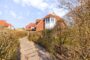 Große Eigentumswohnung in Sackgassenlage mit Südterrasse und Garage - BILD