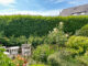 Lichtdurchflutetes Mittelhausteil mit Süd-Terrasse und Stellplatz in Tinnum - BILD